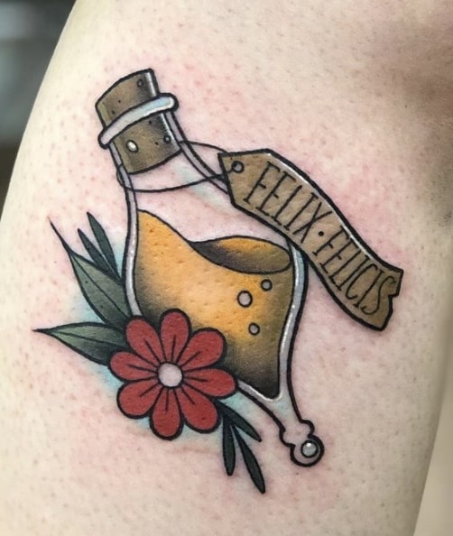 liquid luck tattoo
