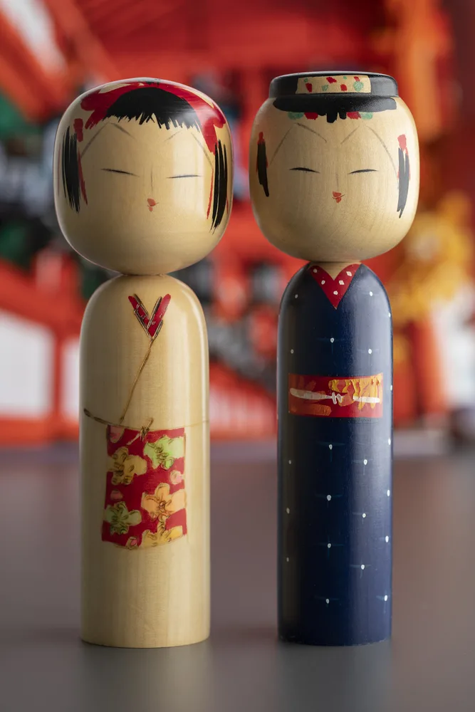 Pair of traditional wooden Japanese kokeshi dolls